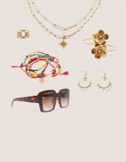 Entdecke Accessoires, die jedes Outfit perfekt abrunden – von praktischen Essentials bis hin zu auffälligen Details.
