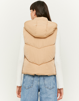beige sleeveless puffer jacket