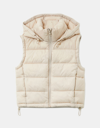 beige sleeveless puffer jacket