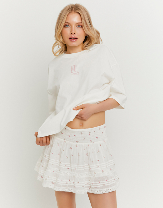 Beiger Minirock mit Blumenmuster und niedrigem Bund | TALLY WEiJL