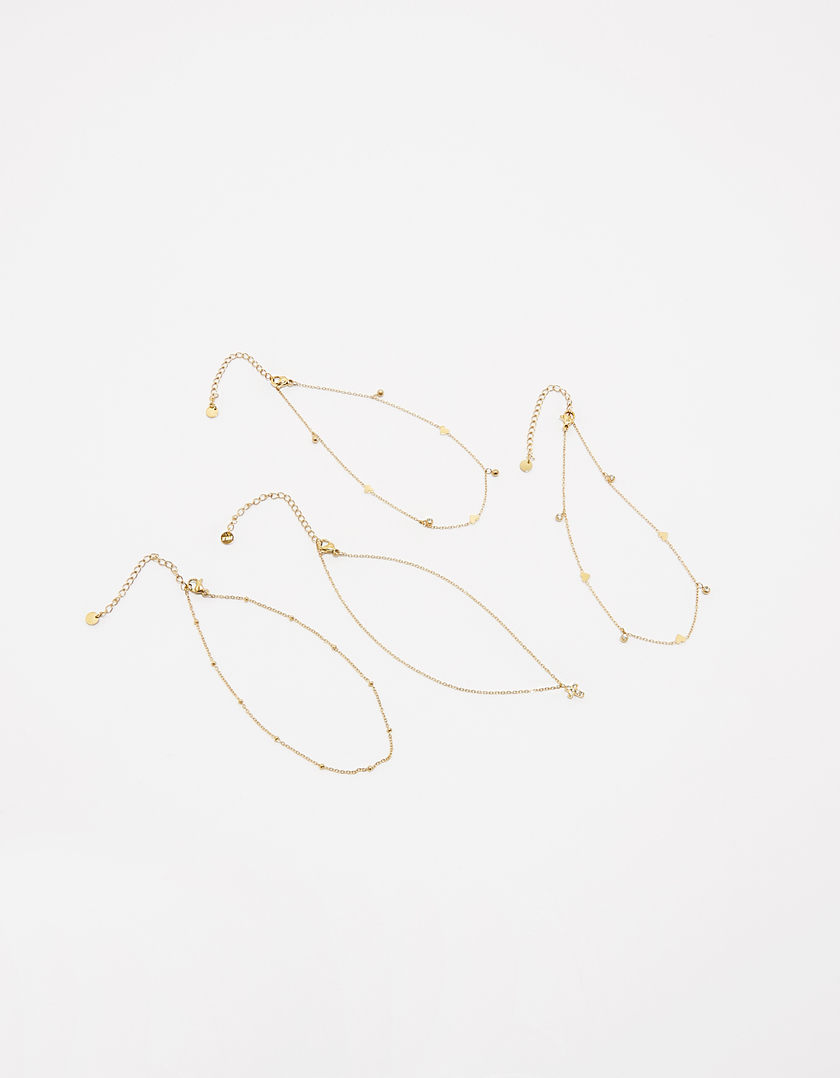 Set 4 cavigliere con pendenti