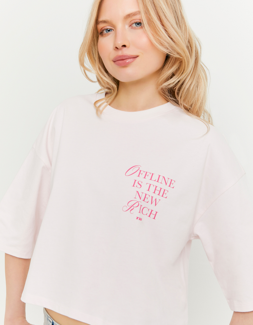 Różowy oversize’owy T-shirt z nadrukiem